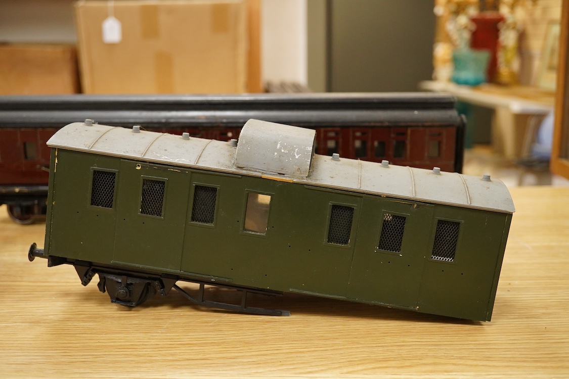 Two Gauge One bogie coaches; a Midland Railway clerestory coach, together with a 12-wheel Pullman car (bogies af), plus an American outline caboose, some scratch building and adaptation from kits, etc.